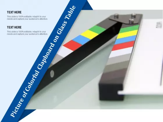 Picture Of Colorful Clapboard On Glass Table Ppt PowerPoint Presentation File Tips PDF
