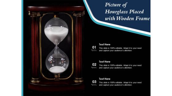 Picture Of Hourglass Placed With Wooden Frame Ppt PowerPoint Presentation Gallery Layout Ideas PDF