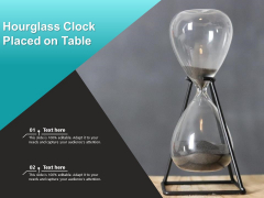 Hourglass Clock Placed On Table Ppt PowerPoint Presentation Gallery Gridlines PDF
