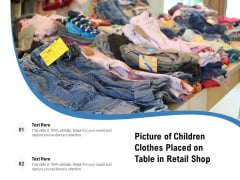 Picture Of Children Clothes Placed On Table In Retail Shop Ppt PowerPoint Presentation Slides Images PDF Picture Of Children Clothes Placed On Table In Retail Shop Ppt PowerPoint Presentation Slides Images PDF